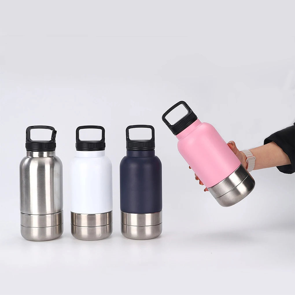 Set of four insulated water bottles with different colors on a white background