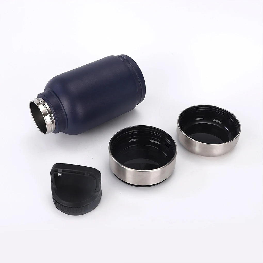 Set of black and silver insulated containers on a white background