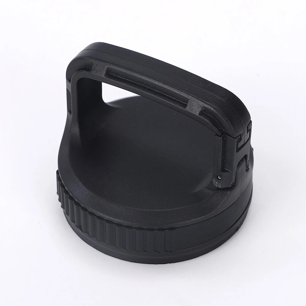 Black plastic lid with handle on a white background