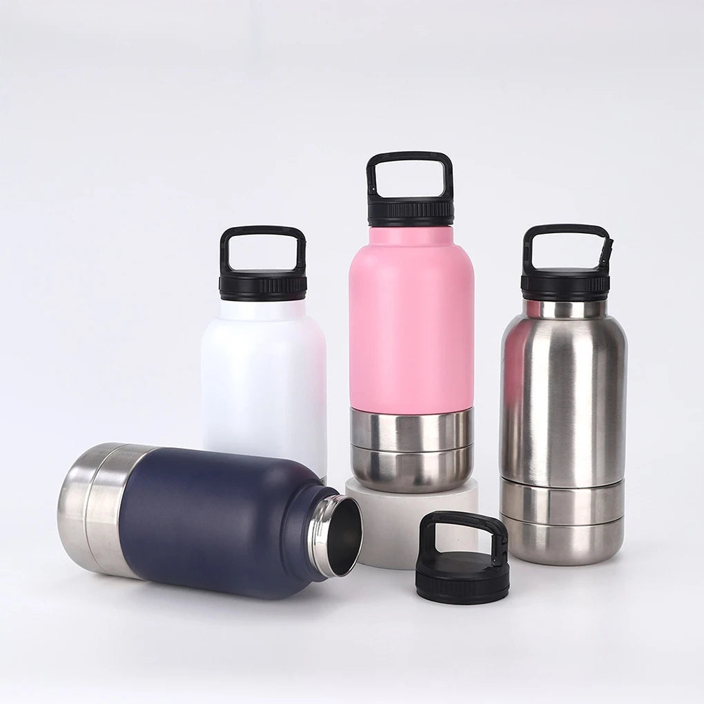 Set of stainless steel water bottles with black lids on a white background